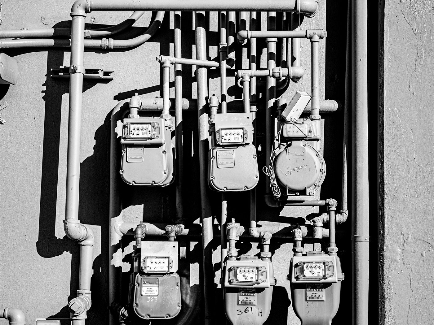 A bank of utility meters and pipework
